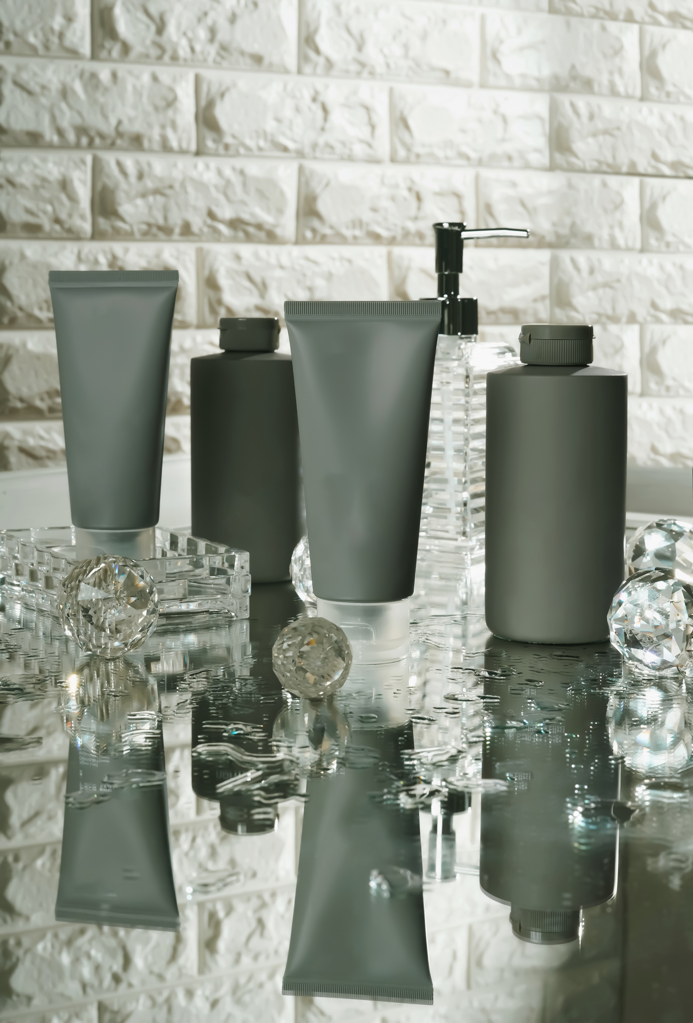 Unbranded blank cosmetics, soap, skincare, cream and shampoo packaging on a fresh background. Skincare female and male skincare products packaging